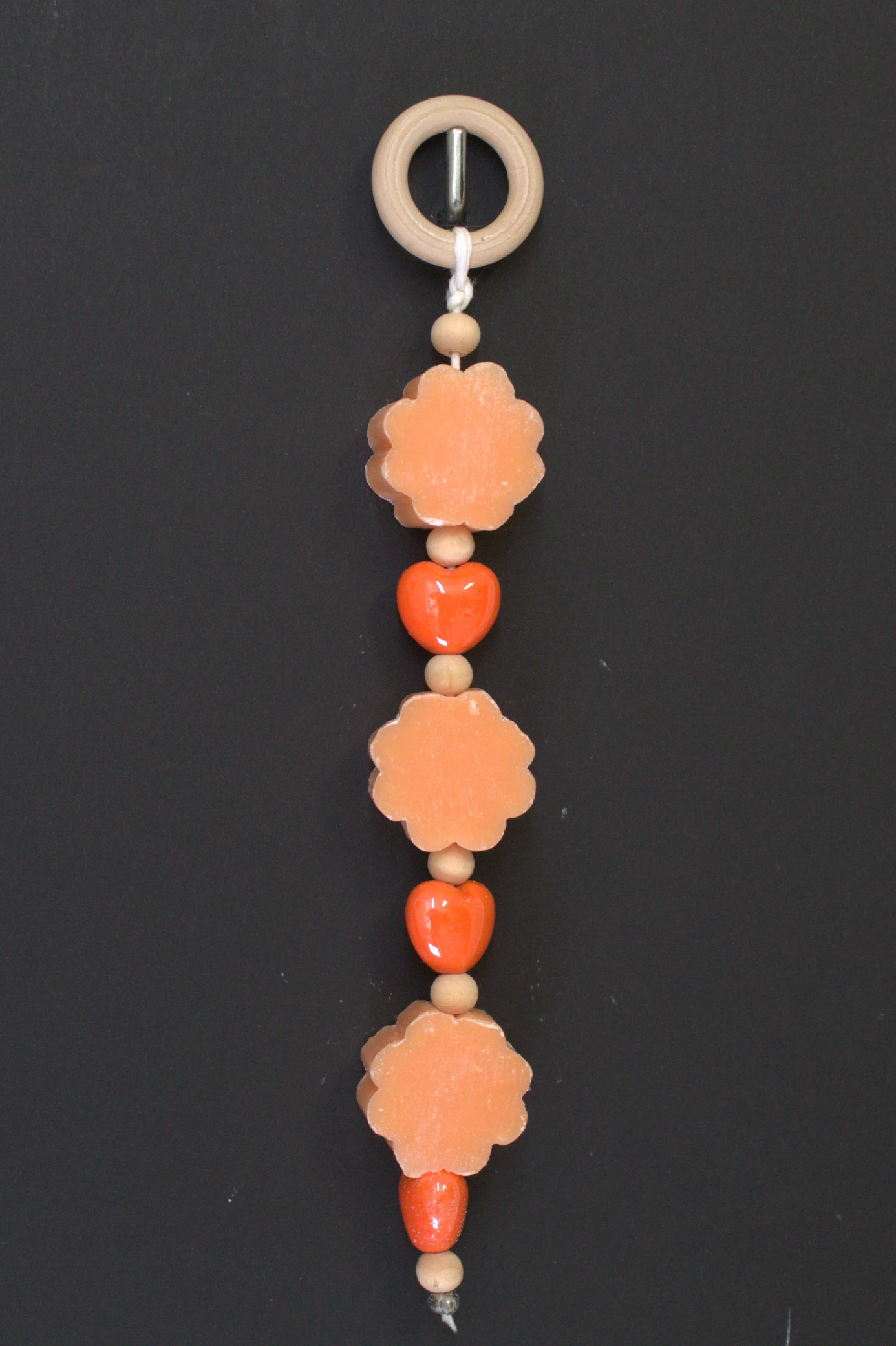 Treccia saponi a fiore arancio decorata